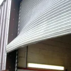 Maatskappy 2 beeld INDUSTRIAL ROLLER SHUTTERS shutter door repairs in Johannesburg GP