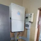 Maatskappy 7 beeld QEW SOLAR PROJECTS PTY LTD Tiling Improvements in Rustenburg NW